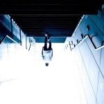 Man walking upstairs upside down