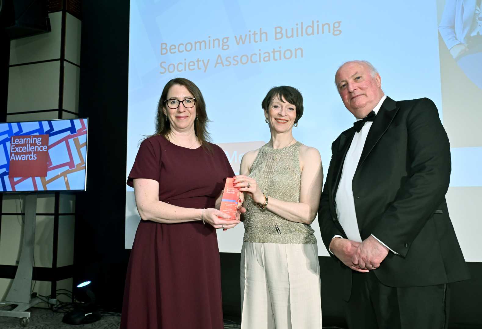 Liz & Alison accepting the award on behalf of Becoming & the Building Societies Association